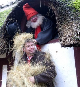 The old houses are decorated to illustrate the olden days Christmas - here the "drillenisse" - meaning the nisse teasing the peasant until he gave some proper food. Picture: Frilandsmuseet Finn Brasen