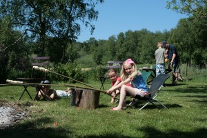 Bonfires and sno brød in the garden are a special summer house treat.